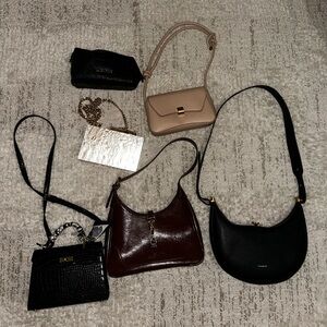 Bundle of purses and handbags